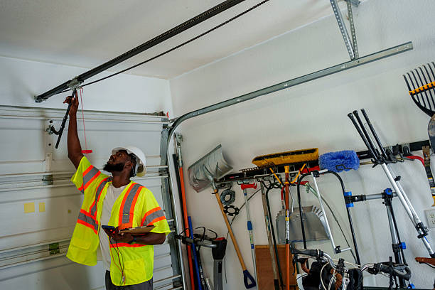 Professional Garage Door Panel Replacement technician working in Devens, MA